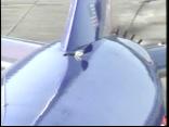 Hole Rips Through Plane Fuselage