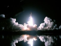 Shuttle Discovery Docks at Space Station