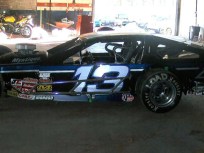 Own a Convicted Trash King's Race Cars 