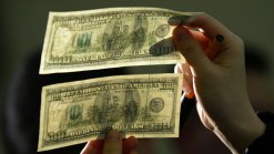 Father, Son Nabbed on Counterfeit Charges  