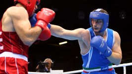 Great Britain's Joshua Wins Gold Over Italian Boxing Champ Cammarelle  in Tiebreaker