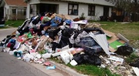 AG Sues Imprisoned Trash King