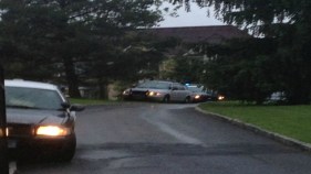 Suspect Killed by Police Outside Mansion