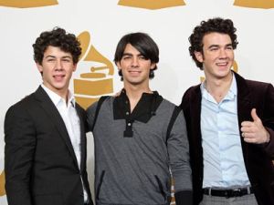 Fraternal trio the Jonas Brothers will celebrate their Grammy nomination with some flag football and Pinkberry.
