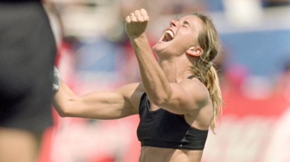PASADENA, CA - JULY 10:  Brandi Chastain of Team USA celebrates during the Women's World Cup against Team China at The Rose Bowl on July 10, 1999 in Pasadena, California. Team USA won 5-4. (Photo by J