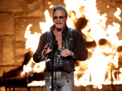 rourke accepts a "guy of the year" award from the Spike network. 