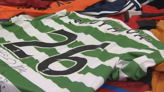 Quinnipiac Womens soccer coach Dave Clarke is auctioning off dozens of Pro soccer jerseys from all over the world in memory of a teacher who lost her life in the Sandy Hook shooting.