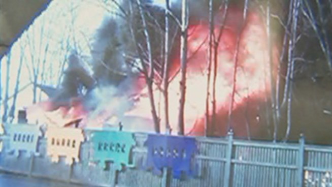 An auto shop was quickly engulfed in flames and destroyed, while damaging surrounding buildings.