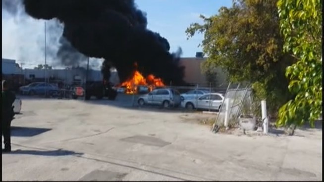 The parking lot where a small plane went down in Fort Lauderdale was lit up Friday night so authorities could investigate into the evening. Witnesses Rick Blackburn and Ebbey Davis Fort Lauderdale Police spokeswoman Detective DeAnna Garcia spoke about the crash that killed all three people aboard.