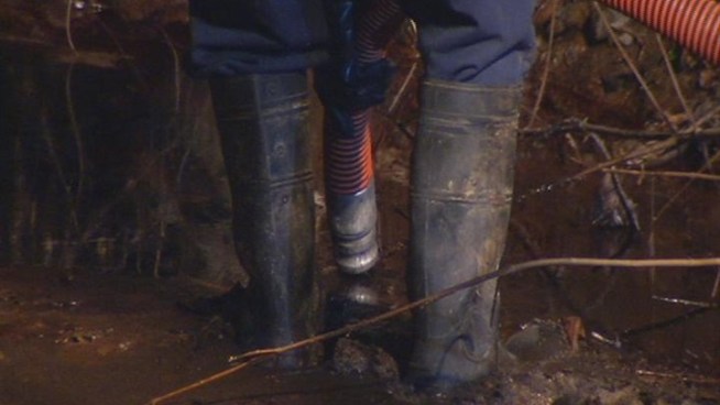 Crews spent much of Thursday evening cleaning up oil that spilled into a small pond, after copper piping connected to the oil tank was stolen.