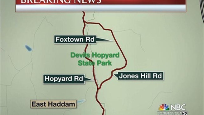 Fire officials from 13 towns are monitoring a large brush fire that has burned at least 24 acres in East Haddam overnight.