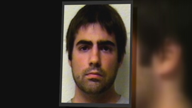 Police have arrested a man accused of hacking into a woman's account and then sending her threats, demanding nude photos.