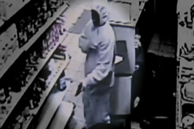 Cameras were rolling inside the One Way Corner Mini Mart in New Haven, as thieves burst in, fired shots and made off with only $7.