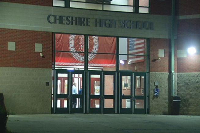 Cheshire Police will step up patrols at the high school after a message was scrawled in a bathroom.