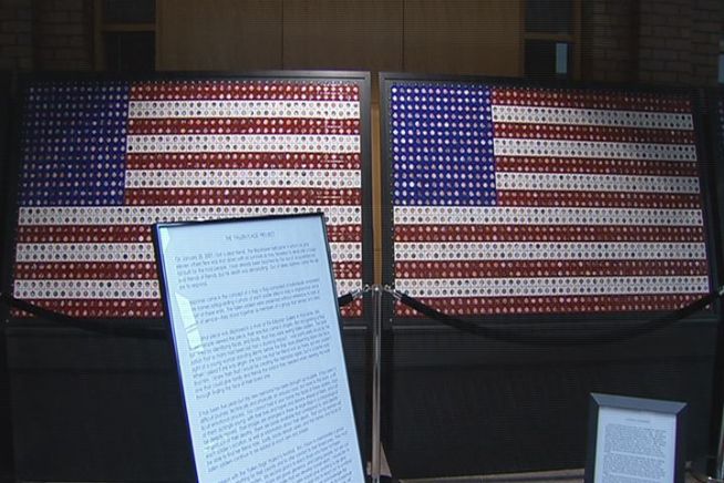 The project, which is displayed at New Haven City Hall, shows the faces of the more than 6,000 men and women who have lost their lives fighting in Iraq and Afghanistan.