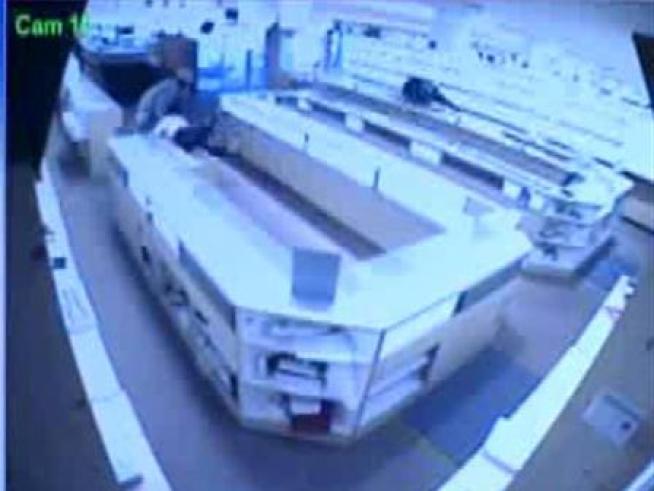 Manchester Police are looking for an armed robber who held a group of employees at gunpoint inside Marshalls on Hale Road. The incident prompted a manhunt that closed down major roads in Manchester and South Windsor Thursday morning.