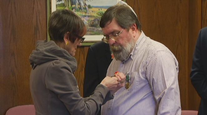 Congresswoman Rosa DeLauro pinned the former combat engineer.
