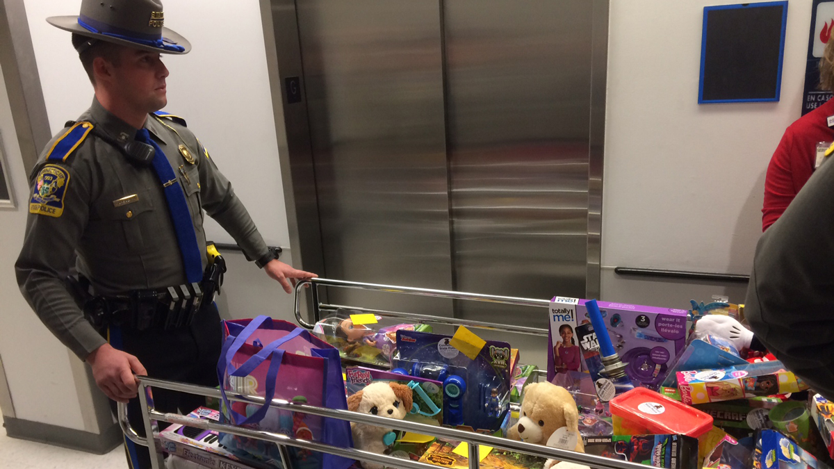 State Troopers Play Santa at Connecticut Children's