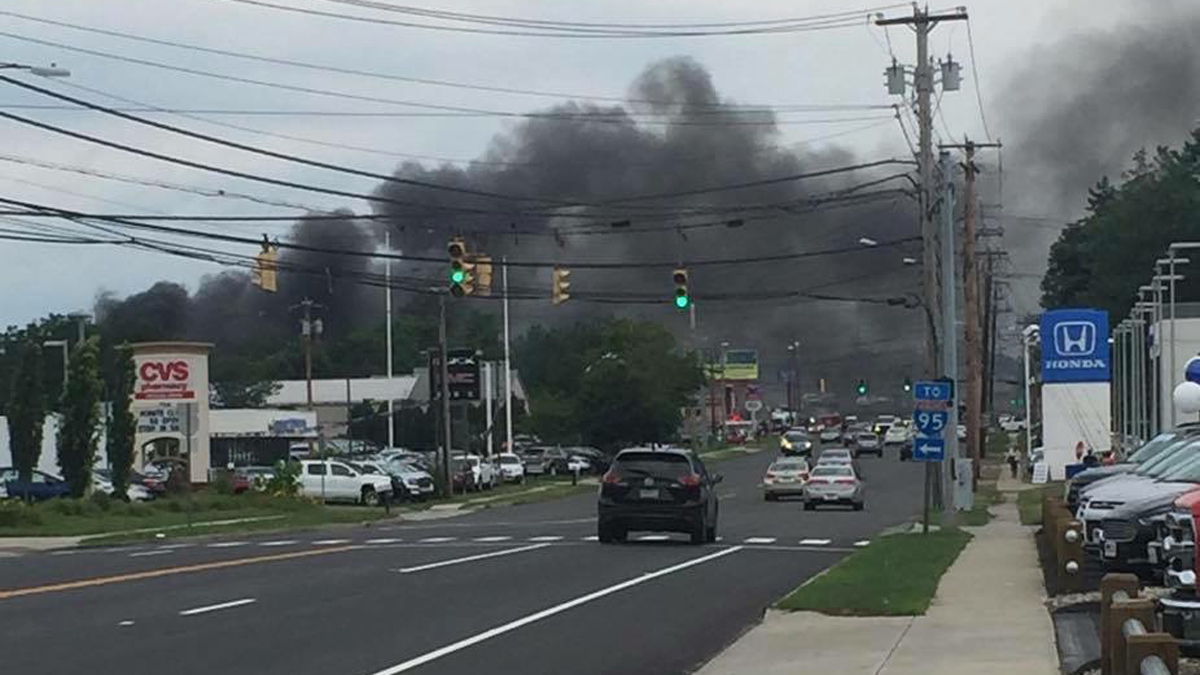 Crews Battle Junk Yard Fire in Milford