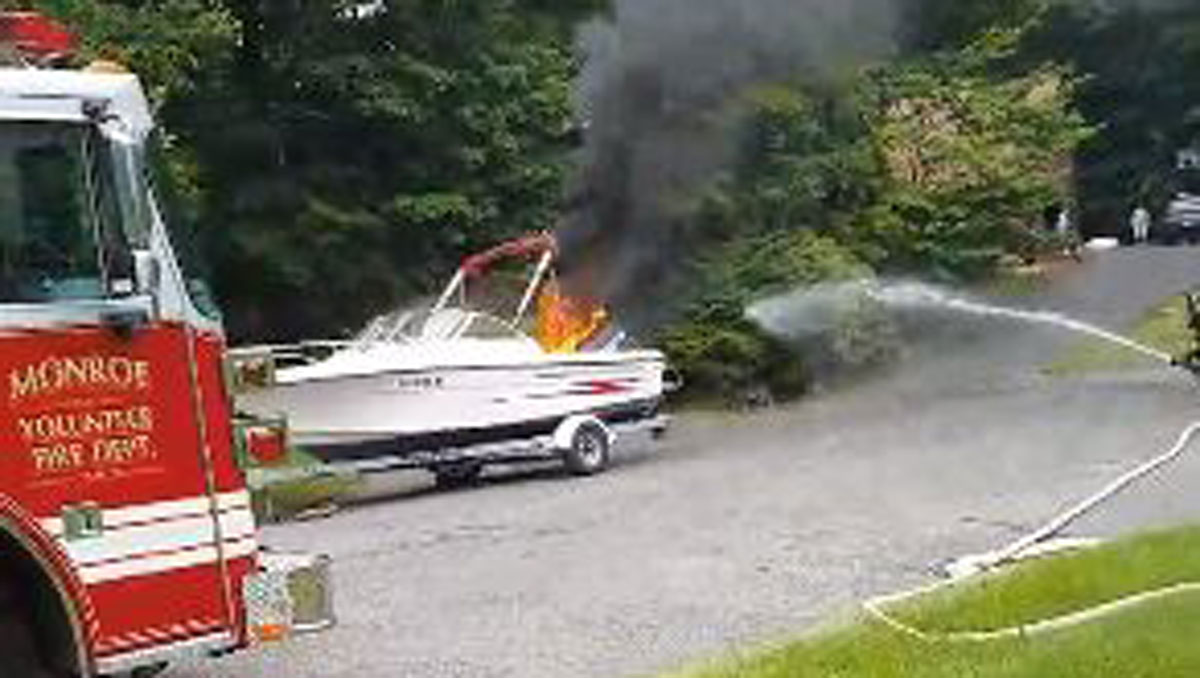 Crews Put Out Boat in Fire in Monroe Home Driveway