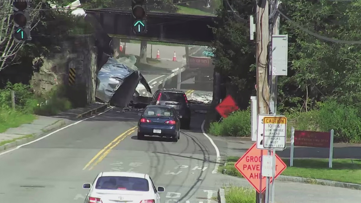 WATCH: Truck Slams Into Bridge