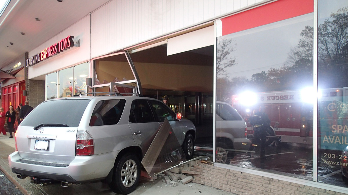 SUV Runs Into Westport Building