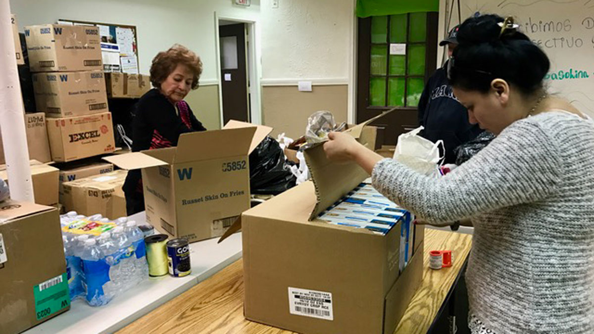 Women From Peru Collect Donations for Country's Flood Victims