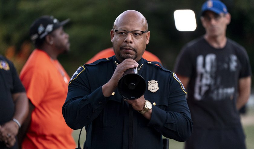Seattle Police Chief Shon Barnes speaks during a vigil.