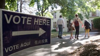 In this file photo, voters walk to a precinct place at the Sierra 2 Center for the Arts and Community to cast their ballots Tuesday, June 5, 2018, in Sacramento, Calif.