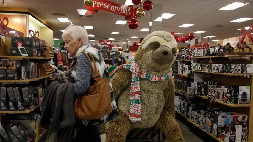 Customers shop at a Kohl's store in Colma, Calif., Friday, Nov. 29, 2019. Black Friday once again kicked off the start of the holiday shopping season.