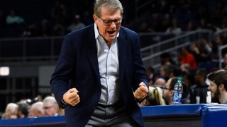 Connecticut head coach Geno Auriemma cheers during the second half of an NCAA college basketball game against DePaul on Monday, Dec. 16, 2019 in Chicago, Illinois.