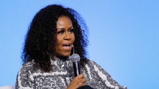 In this Dec. 12, 2019, file photo, former U.S. fist lady Michelle Obama speaks during an event for Obama Foundation in Kuala Lumpur, Malaysia.