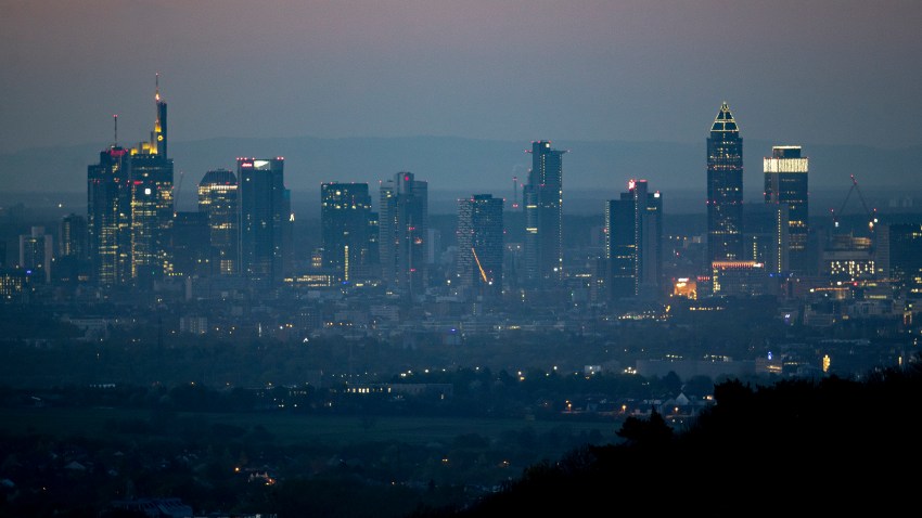 The buildings of the banking district are seen in Frankfurt, Germany, early Tuesday, April 14, 2020. Due to the coronavirus the economy expects worldwide heavy losses.