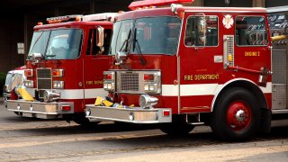 Fire trucks parked outside of station.
