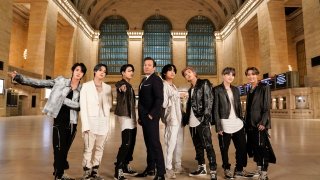 In this Feb. 24, 2020, file photo, (l-r) Jin, Jimin, and Jungkook of BTS, with host Jimmy Fallon and V, RM, SUGA, and J-Hope of BTS perform for "The Tonight Show Starring Jimmy Fallon" in Grand Central Terminal.