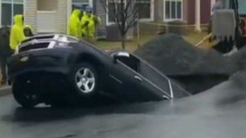 An SUV fell into a sinkhole in Easton, Pennsylvania.