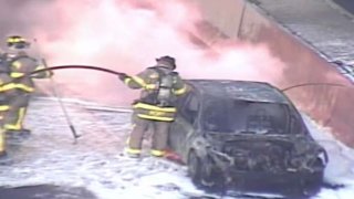 A car on fire on Interstate 95 in West Haven