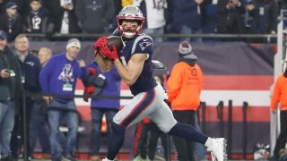 New England Patriots wide receiver Julian Edelman (11) makes a catch before an AFC Wild Card game between the New England Patriots and the Tennessee Titans on January 4, 2020, at Gillette Stadium in Foxborough, Massachusetts.