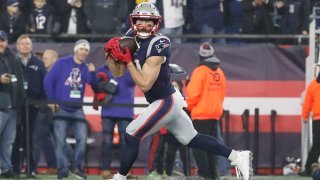 New England Patriots wide receiver Julian Edelman (11) makes a catch before an AFC Wild Card game between the New England Patriots and the Tennessee Titans on January 4, 2020, at Gillette Stadium in Foxborough, Massachusetts.