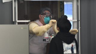 Medical staff member taking samples