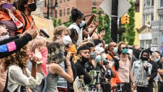In this May 28, 2020, file photo, protesters clash with police during a rally against the death of George Floyd at the hands of police in New York's Union Square — one of several rallies nationwide.