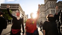 In this May 29, 2020, file photo, protesters gather outside of City Hall after a peaceful march across the city in Louisville, Kentucky.