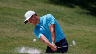FORT WORTH, TEXAS – JUNE 11: Cameron Champ of the United States plays a shot from a bunker on the 18th hole during the first round of the Charles Schwab Challenge on June 11, 2020 at Colonial Country Club in Fort Worth, Texas. (Photo by Tom Pennington/Getty Images)