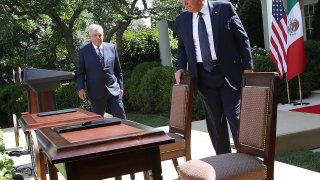 President Donald Trump and Mexican President Andrés Manuel López Obrador prepare to sign a joint trade declaration in the Rose Garden at the White House July 8, 2020 in Washington, DC. Trump and López Obrador met privately in the Oval Office earlier in the day and are scheduled to deliver a joint press statement later in the day.
