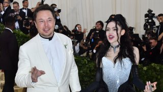Elon Musk and Grimes arrive for the 2018 Met Gala on May 7, 2018, at the Metropolitan Museum of Art in New York.