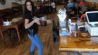 Lauren Boebert, owner of the Shooters Grill, has gained national attention for her decision to encourage her staff to carry a firearm during work on May 29, 2018 in Rifle, Colorado.