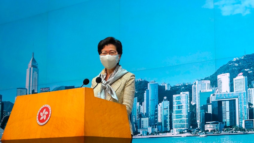 Hong Kong Chief Executive Carrie Lam listens to reporters' questions during a press conference in Hong Kong, Tuesday, June 30, 2020. Hong Kong media are reporting that China has approved a contentious law that would allow authorities to crack down on subversive and secessionist activity in Hong Kong, sparking fears that it would be used to curb opposition voices in the semi-autonomous territory.