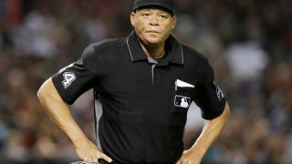 In this file photo, MLB umpire Kerwin Danley (44) stands on the field in the first inning during a baseball game between the Arizona Diamondbacks and the Miami Marlins, Saturday, June 2, 2018, in Phoenix.