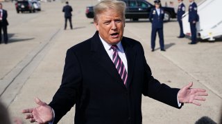 President Donald Trump speaks to the press before boarding Air Force One at Andrews Air Force Base, Feb. 18, 2020, in Maryland.