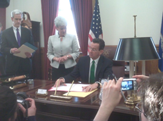 Malloy signing